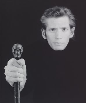 Robert Mapplethorpe (1946-1989), Self-Portrait, 1988. Gelatin silver print: sheet, 22 7/8 × 19 in. (58.1 × 48.3 cm); image, 22 7/8 × 19 in. (58.1 × 48.3 cm). Whitney Museum of American Art, New York; gift from the Emily Fisher Landau Collection 2019.474. © The Robert Mapplethorpe Foundation. Used by permission