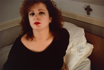 Nan Goldin (b. 1953), Self-portrait with milagro, The Lodge. Belmont, Ma. 1988, 1988. Silver dye bleach print: sheet, 27 3/8 × 40 in. (69.5 × 101.6 cm); image, 25 3/4 × 38 7/16 in. (65.4 × 97.6 cm). Whitney Museum of American Art, New York; gift from the Emily Fisher Landau Collection 2019.466. © Nan Goldin/Courtesy Marian Goodman Gallery, New York, Paris, London