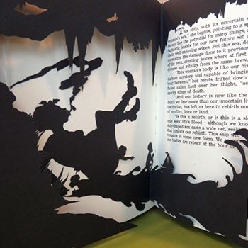 Kara Walker, Freedom, A Fable: A Curious Interpretation of the Wit of a Negress in Troubled Times (detail), 1997, Printed and die-cut pages in faux leather cover, 9 1/2 in. x 8 in. x 3/4 in., Gift of Kevin Concannon and Margo Crutchfield, 2015.049