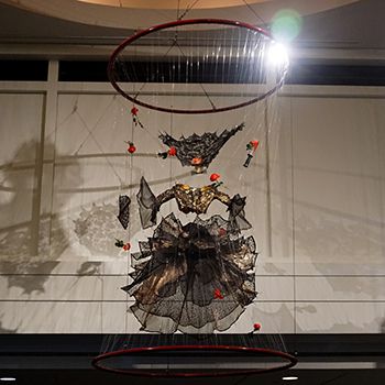 Carmen (Carmen, Bizet), c. 2009-2010, Retired wardrobe from New York City Opera, Stainless steel rings, monofilament, artificial roses, prop knife and hardware, 120h x 72w x 72d in.