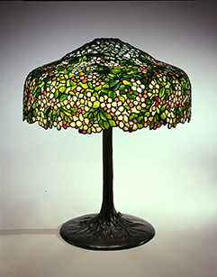 Tiffany Studios, New York (1902-1932),  Apple Blossom Library Lamp, ca. 1905, Leaded glass and patinated bronze, diameter 18 inches, Courtesy of The Neustadt Collection of Tiffany Glass, New York. Photo: David Schlegel.