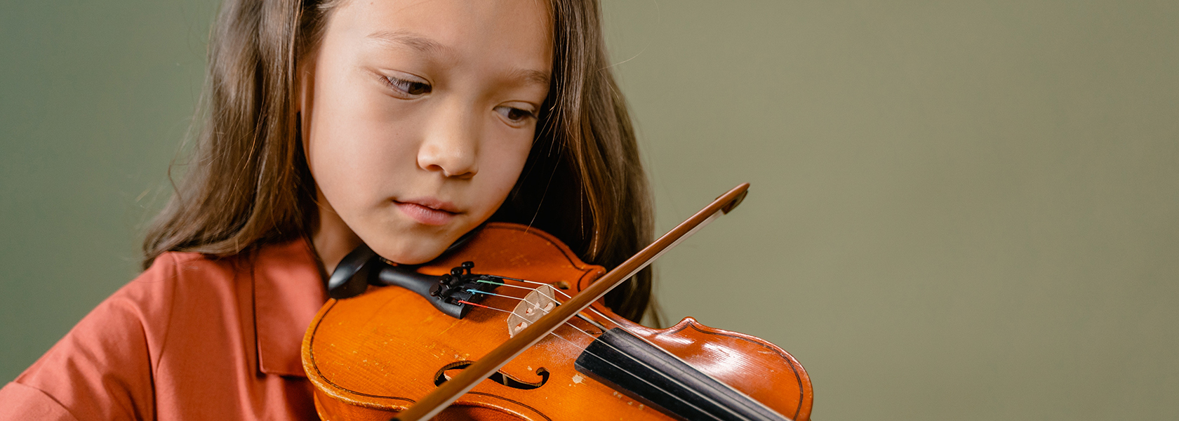 Child playing violin