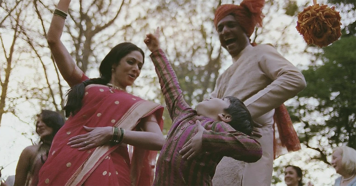 A Hindu family sings and dances